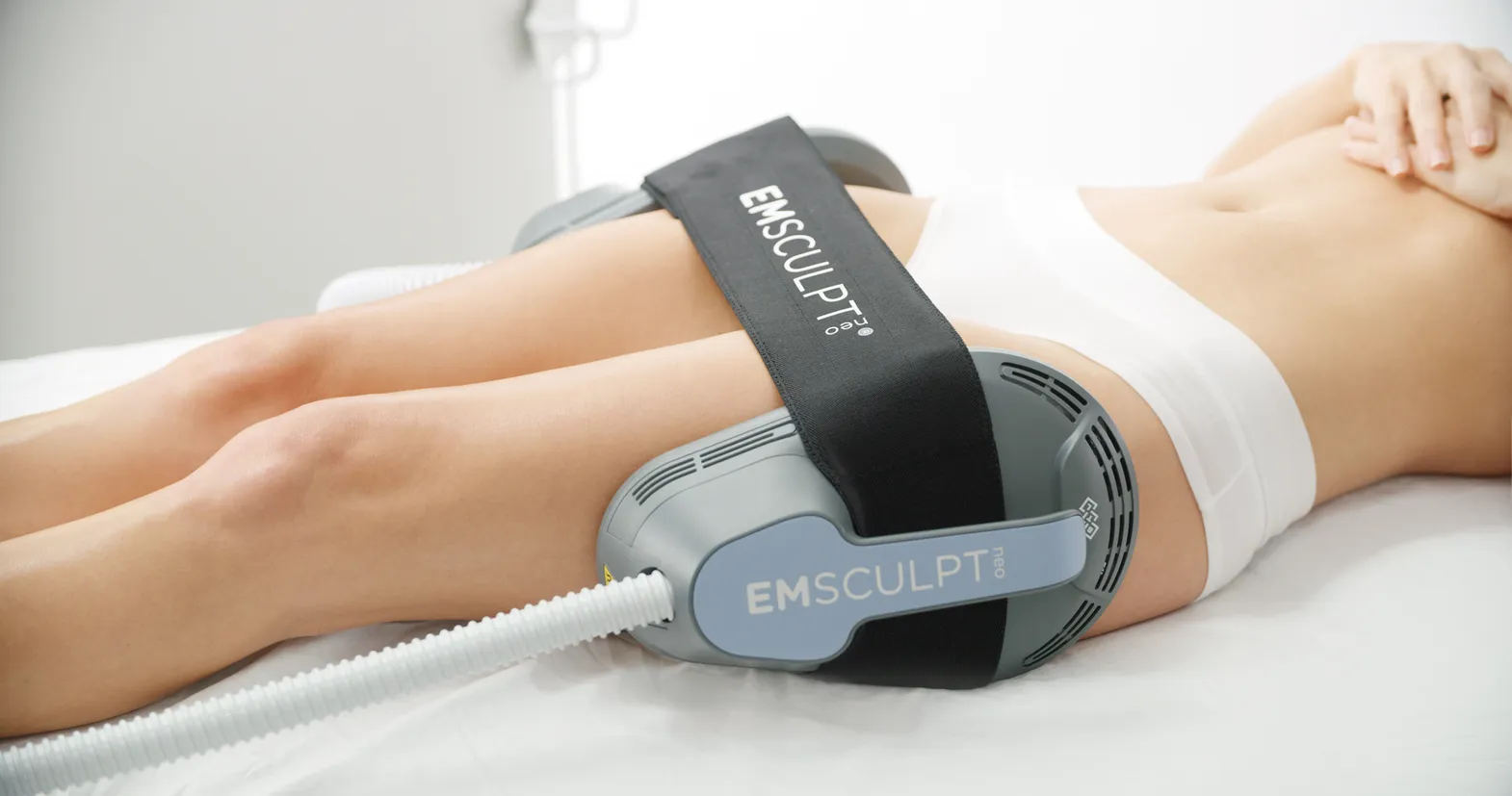 a woman getting Emsculpt NEO for outer thighs